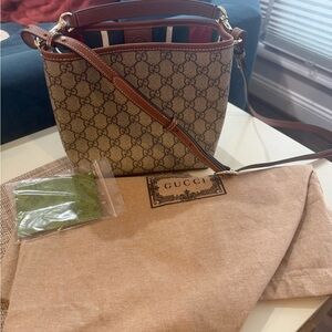 GG Emblem Nano Bucket Bag w Crossbody